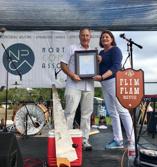 Kicking off the summer concert series in North Park’s Bird Park and recognizing past North Park Community Association President Edwin Lohr for his service.