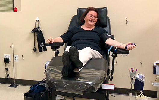Senator Atkins donating blood