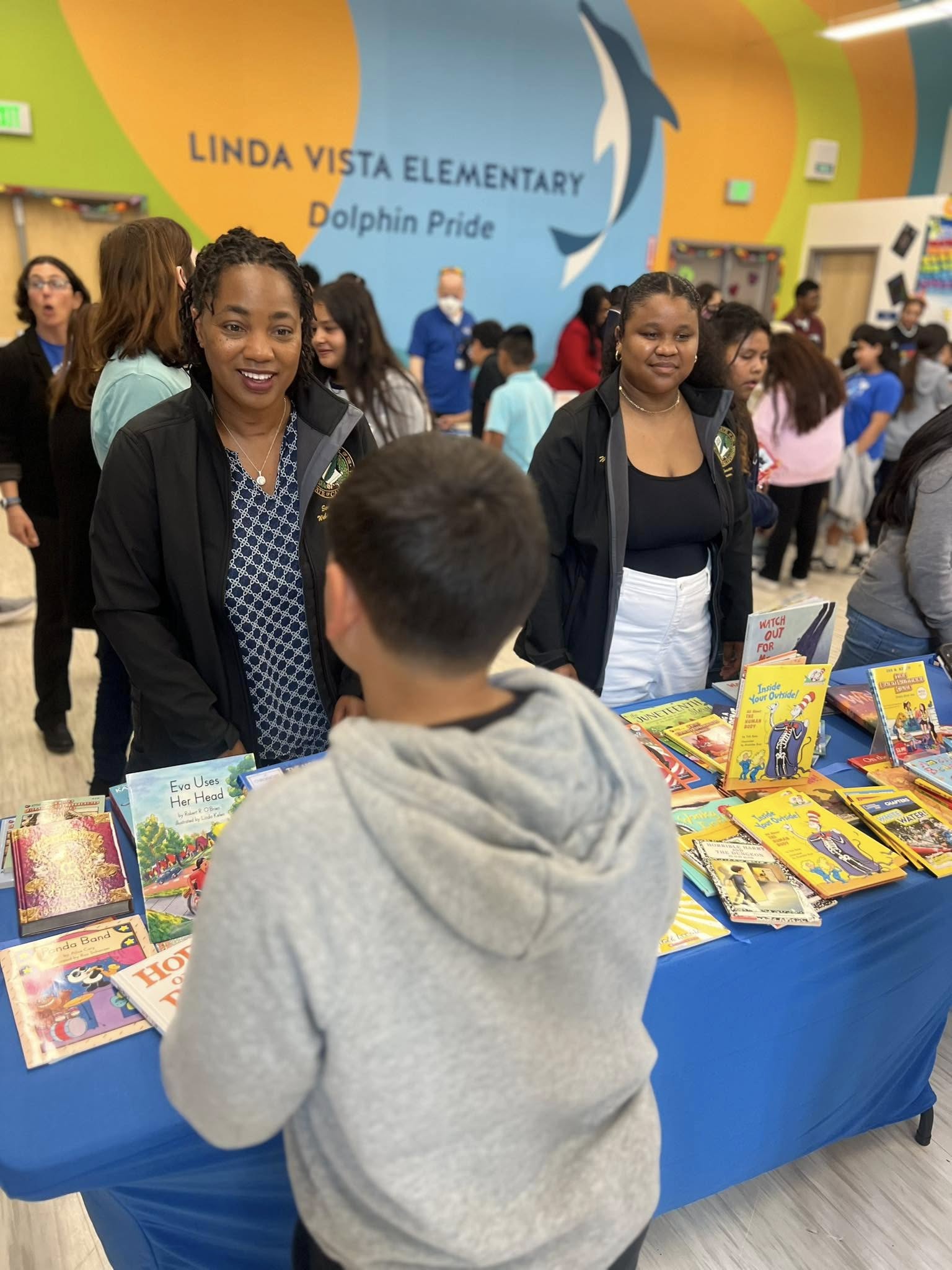 Senator Weber Pierson meets with constituents at the Book Giveaway community event. 